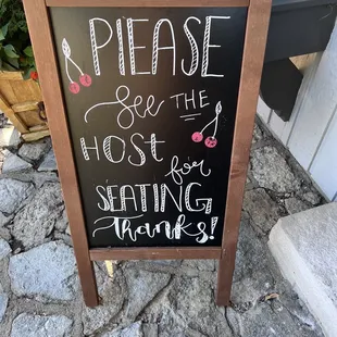 a sign that says please for the host and sharing thanks