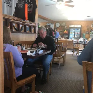 a man and a woman sitting at a table