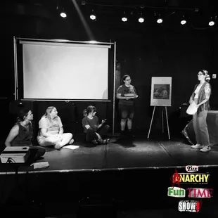 a group of people on stage