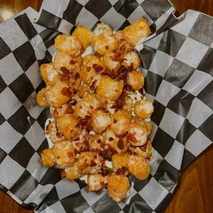 a plate of chicken nuggies on a checkered paper