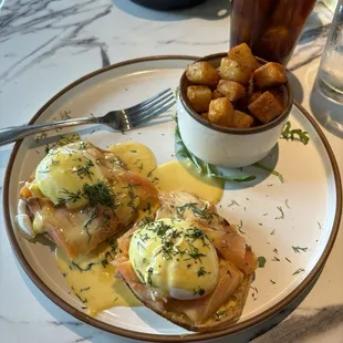 Salmon Bennies with Hollandaise sauce on English muffins with home fries. And a Cold Brew with vanilla syrup. Delicious