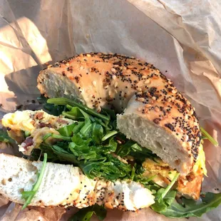 Breakfast sandwich on everything bagel with arugula added- delicious!