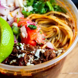 a bowl of mexican food