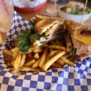 Club sandwich with fries