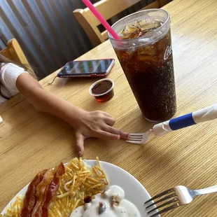 Plastic forks for kids? Bland gravy, flavorless hash browns