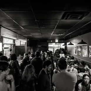 a large group of people in a restaurant