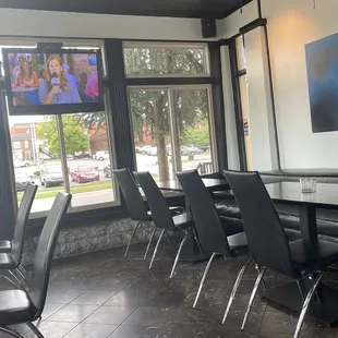 a table and chairs in a restaurant