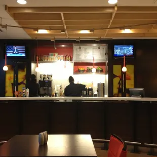 a view of a restaurant counter