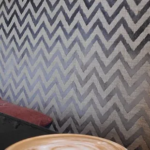 Comfy couch, breakfast on the way, and a large latte with half Vanilla, half Hazelnut.