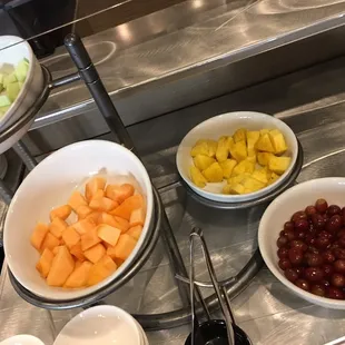 a variety of fruit in bowls