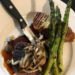 Filet Mignon with Mushrooms and Asparagus Served with Hasselback Potato