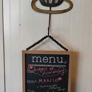 a menu on a chalk board