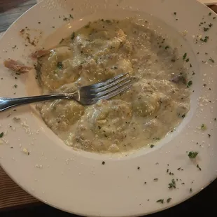 Amazing Truffle Raviolis with sweet sausage with heavy white sauce that's to die for! Highly recommend!!