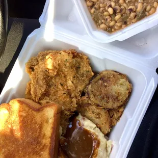 Fried Porkchops, Mashed Potatoes, Fried Green Tomatoes, and Black Eyed Peas of course.. Fantabulous.