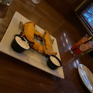 Loaded Potato Skins &amp; unknown fruity drink.  Bartender said he "had us".