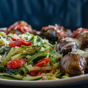 a plate of meat and vegetables