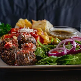 a plate of meat and vegetables