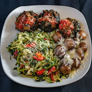 a plate of meatballs and zucchini noodles