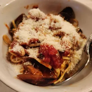 Half portion of seafood linguine shared.