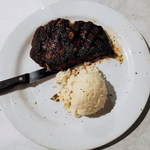 Ribeye, $28.99. Also seasoned well, but a was cooked a tad more than medium well.