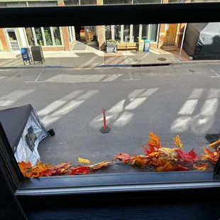 View from our window. General store across the street. Vendors for the Steampunk festival setting up outside.