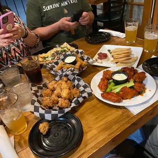 Fried mushroom, fried zucchini, chicken wings, baked Brie, flatbread.