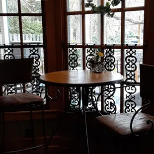 Tables inside by the bar