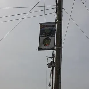 Black mountain banner near restaurant