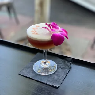 a cocktail in a coupe glass