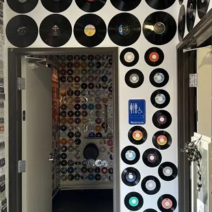 Old school record wall and CD bathroom walls