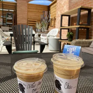 On the patio: small iced lavender honey latte w/oat milk &amp; medium iced chai