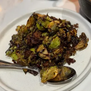 Brussels sprouts with a bacon jam and goat cheese Crema