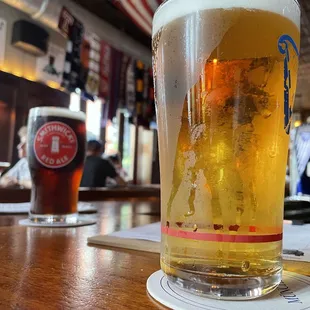 a pint of beer on the bar