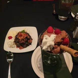 Chocolate Molten Cake w/Peanut Butter, Bacon &amp; Vanilla Ice Cream. Dark Chocolate Mousse with Whipped Cream, Raspberries and Raspberry Syrup