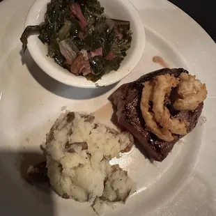 Steak with collard greens and mashed potatoes