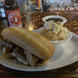 Beef Brisket French Dip Sandwich on French Roll with cheese with potato salad special $15