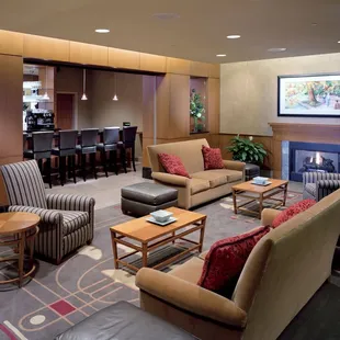 The Blackwell Lounge features a full bar and cozy furniture to relax in.