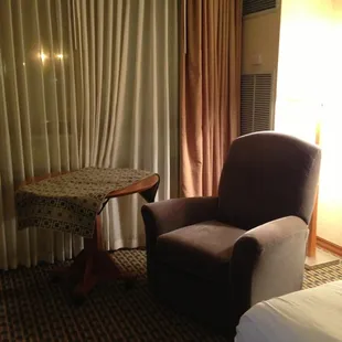 Large armchair and dining table.