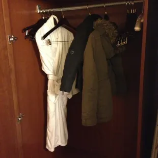 Soft bath robes inside spacious closets.