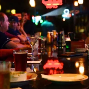 people sitting at a bar