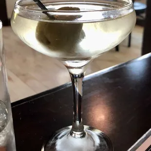 a martini and a glass of water
