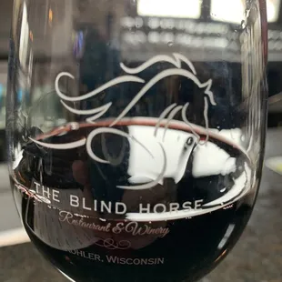 Winery signature wine glass available for purchase.  If you buy a case they will probably throw a couple in free!