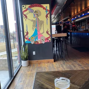 a pint of beer on a table