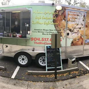a food truck parked in a parking lot