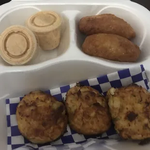 3 crab balls and add a side for another dollar (hush puppies), $12. Better deal than their sampler.