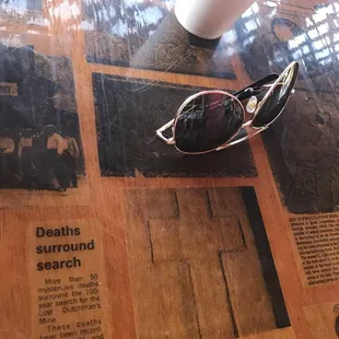 Tables have stories glossed inside so you can sit and read and get a snack from next door.