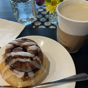 Cinnamon roll and a lavender cappuccino