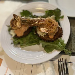Fried green tomatoes with crab and shrimp on top