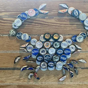 a crab made out of beer caps