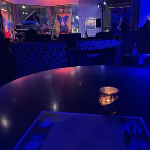 a lit candle on the table